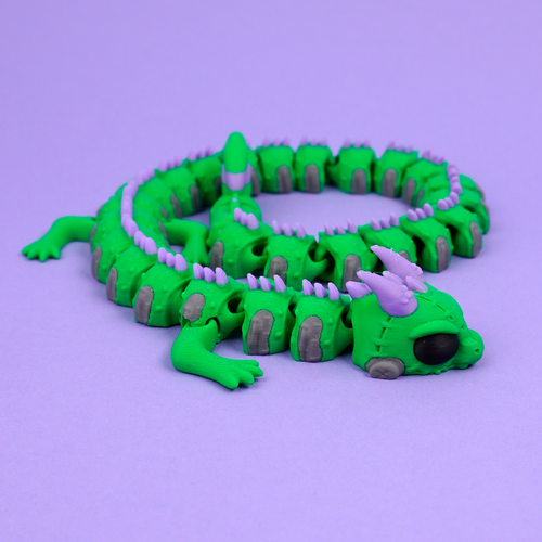 Articulated Frankenstein Dragon coiled on purple background