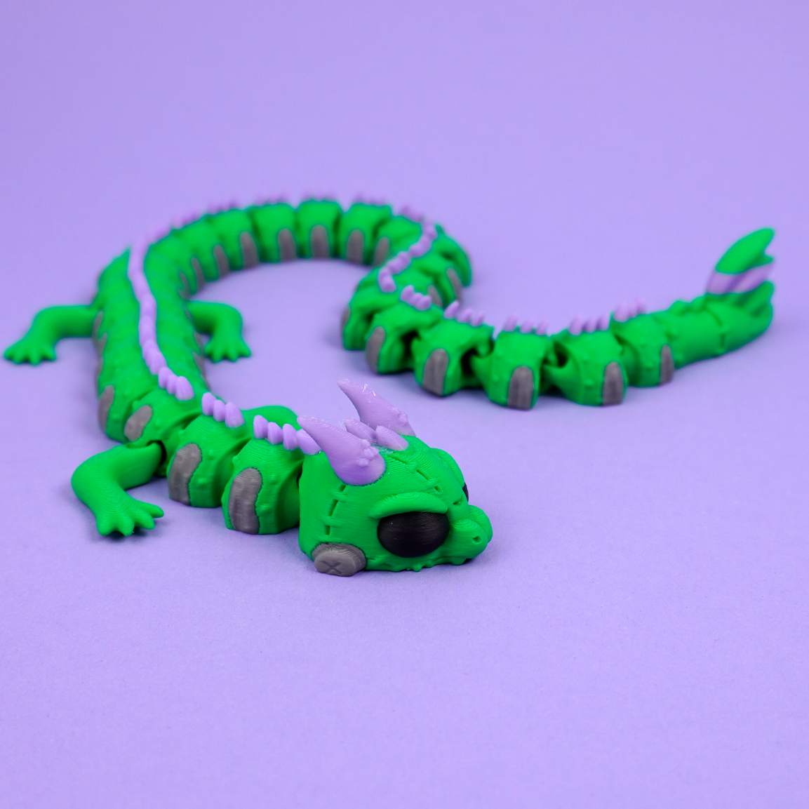 Articulated Frankenstein Dragon held in hand